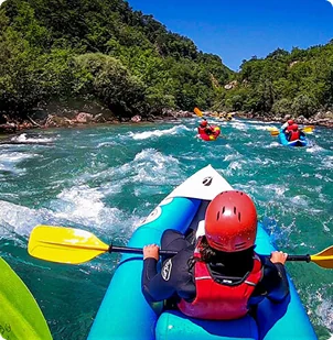 Friends canoeing on Tara River from POV perspective, group paddle adventure Bosnia