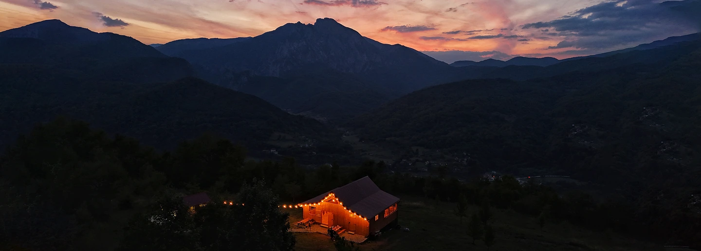 mountain camp sunset with lights on, Sutjeska Bosnia and herzegovina