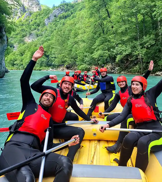 IRF certified rafting guide leading group down Tara River rapids, Sutjeska National Park Bosnia