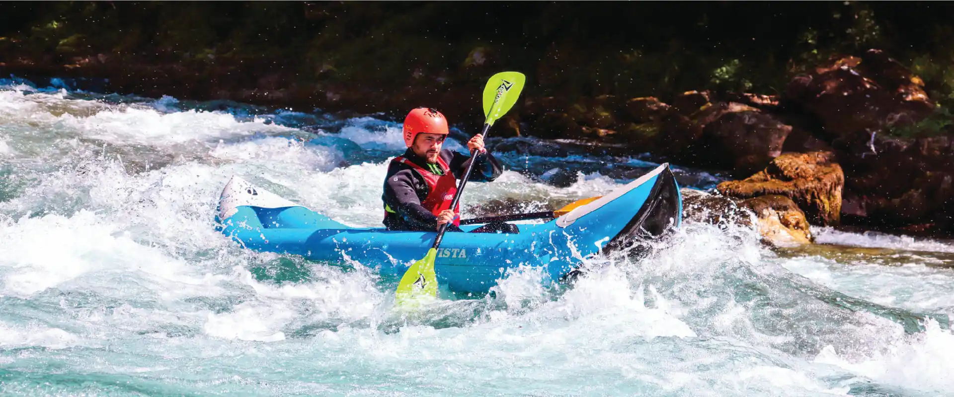 Local guide leading canoeing tour on Tara River, peaceful paddle adventure Bosnia and Herzegovina