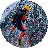 Lead guide going down with rope, canyoning Hrcavka