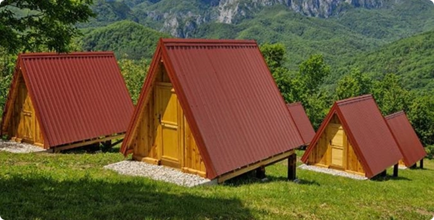 Wooden holiday cabins at Mountain Camp Outdoor Tara, Tjentište Sutjeska National Park Bosnia
