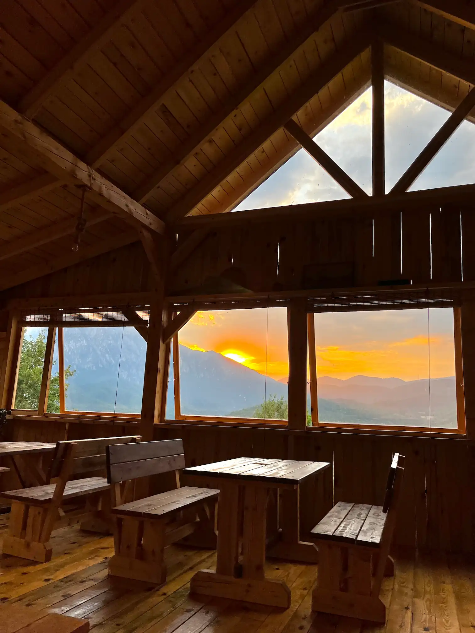 View through windows of Outdoor Tara mountain restaurant, Sutjeska National Park basecamp