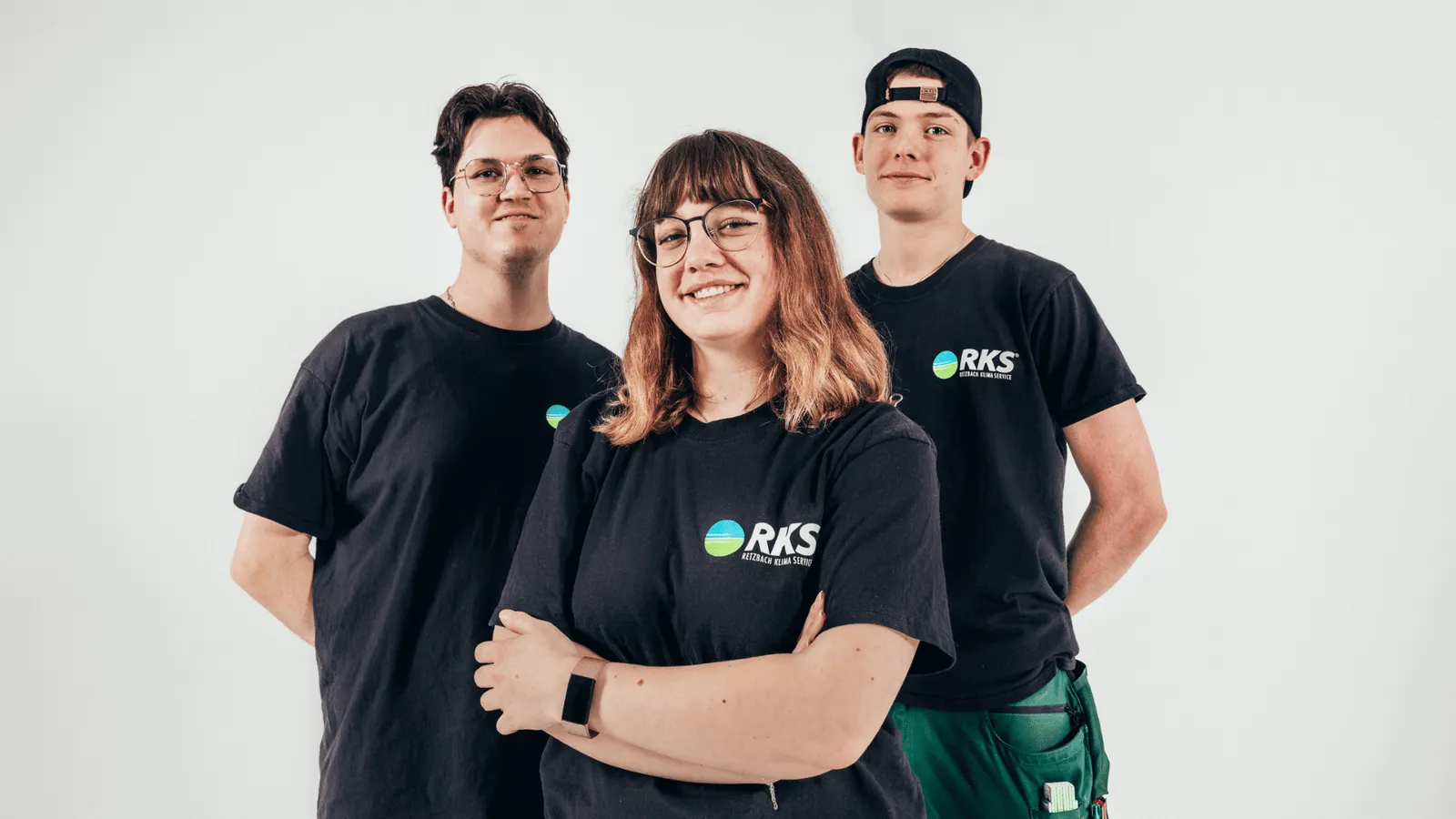 Teambild von drei Mitarbeitern der RKS Gruppe