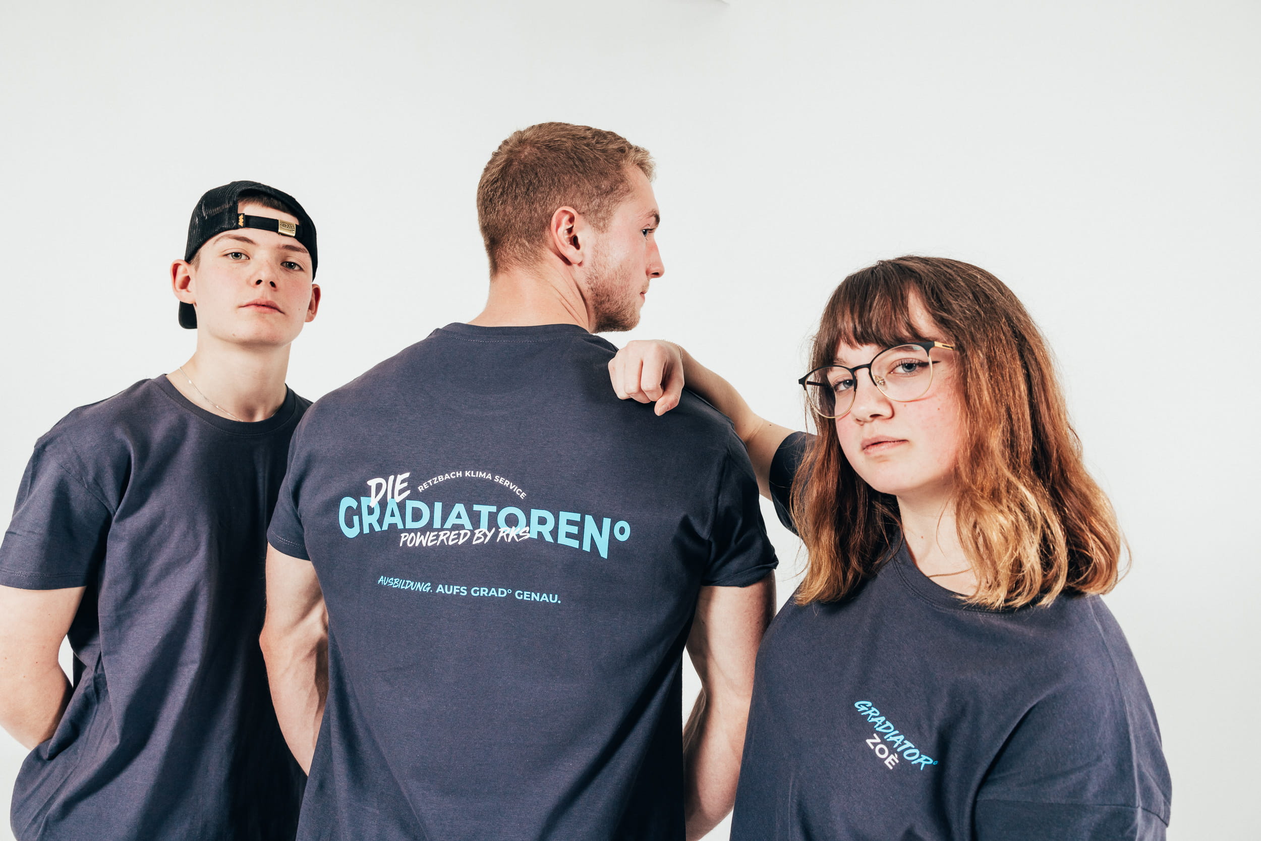 Teambild von drei Gradiatoren der RKS Unternehmensgruppe