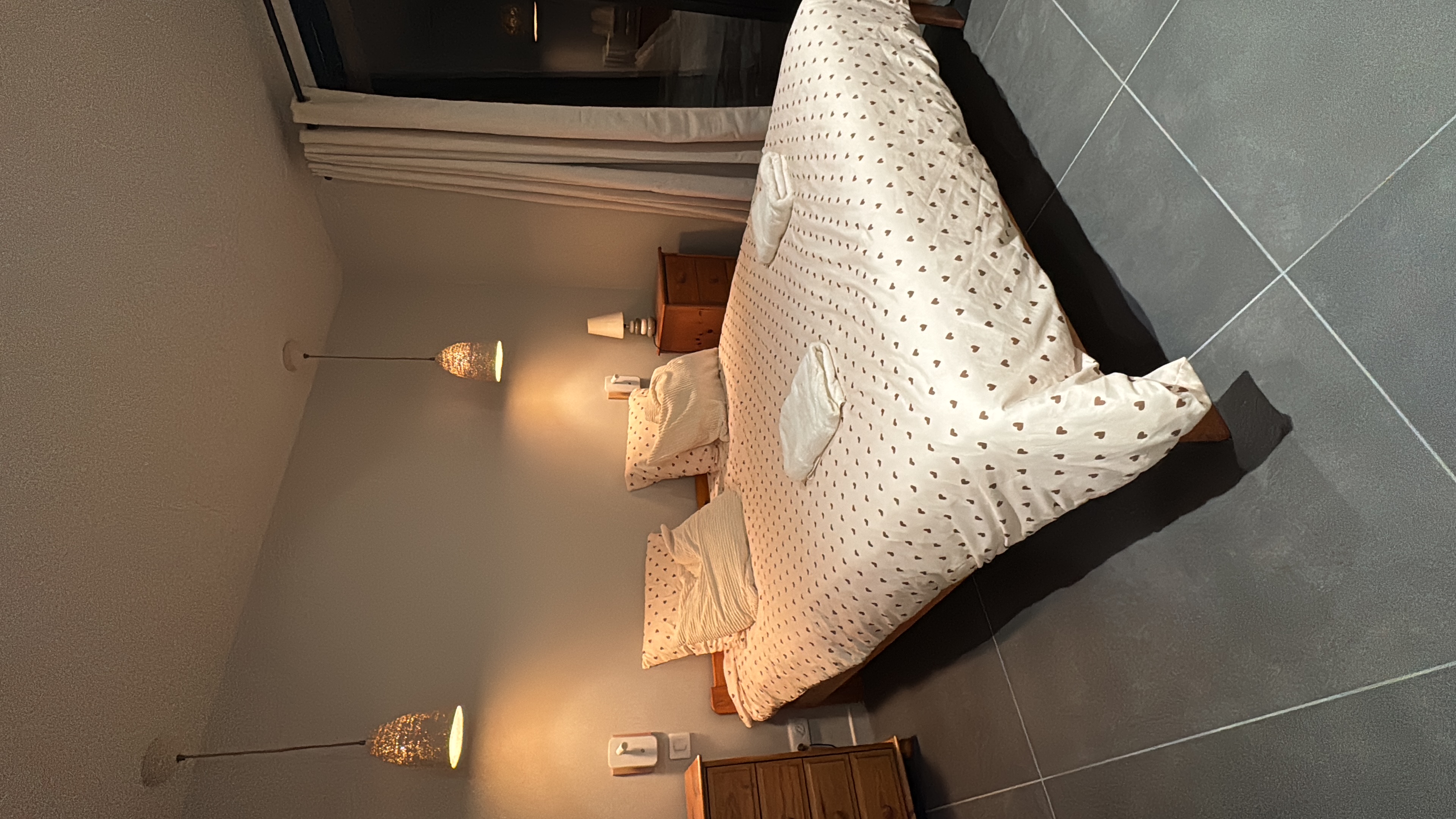 Bedroom of the Vénéon Voyage chalet with a view of the Muzelle glacier.