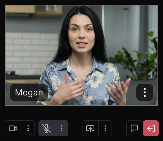Man with beard and denim shirt speaking on a video call interface.