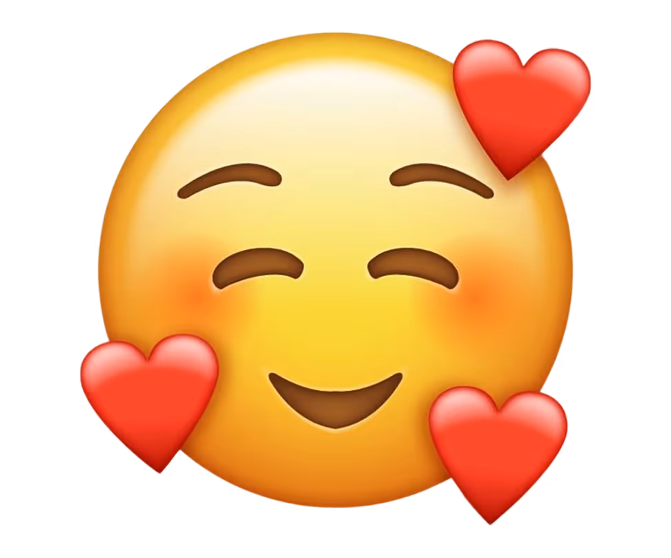Faccina sorridente con occhi chiusi e tre cuori rossi intorno a indicare affetto.