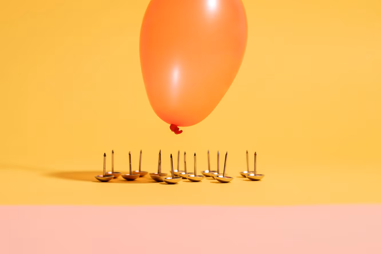 Ballon floating over pins