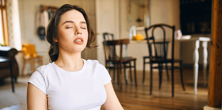 Woman with her eyes closed