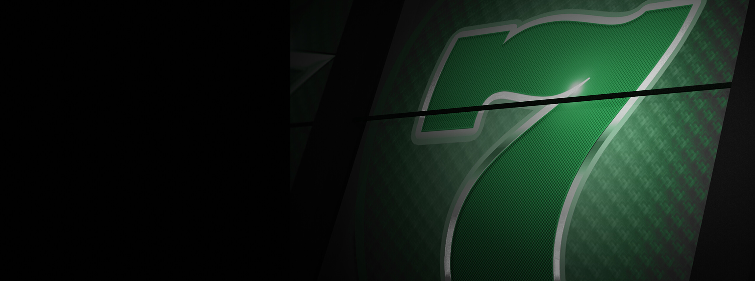 Close-up of a large illuminated green number 7 with a textured pattern on a dark background.