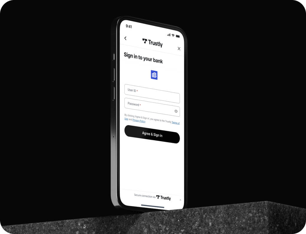 Smartphone displaying Trustly login screen with fields for User ID and Password, and an Agree & Sign in button.