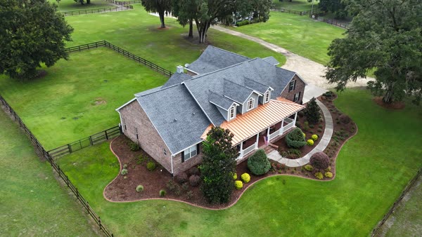Storm-damaged roof section being stabilized in North Central Florida