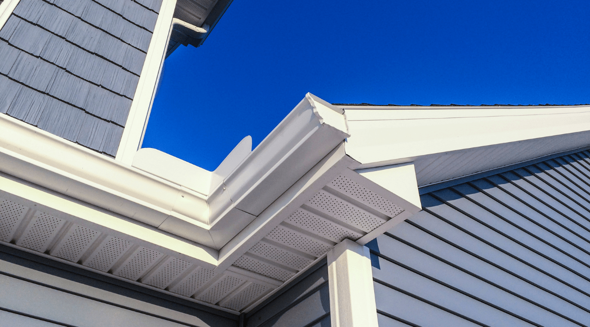 Vented aluminum soffit panels installed under the eaves of a Gainesville home