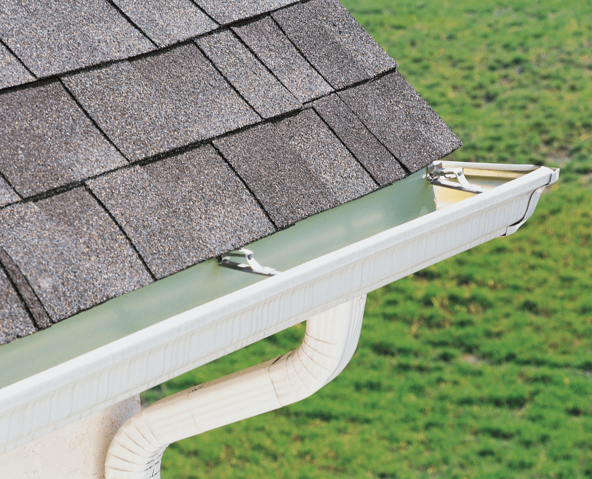 Six-inch seamless gutters and downspout installed by True Force Roofing