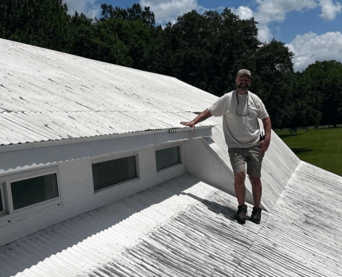 Reflective white roof coating applied to a Gainesville, FL flat roof