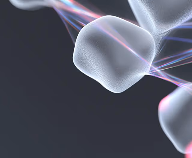 Abstract close-up of translucent cubes connected by glowing light strands.