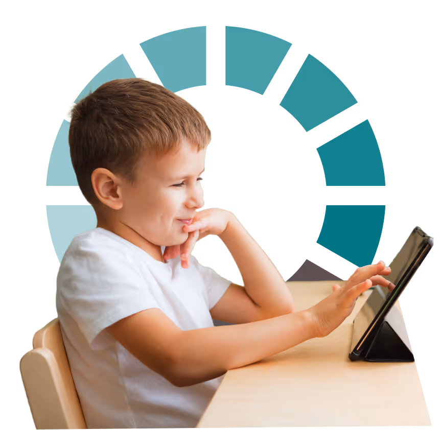A young boy at a desk using a tablet with a thoughtful smile, illustrating cognitive training & skill building.