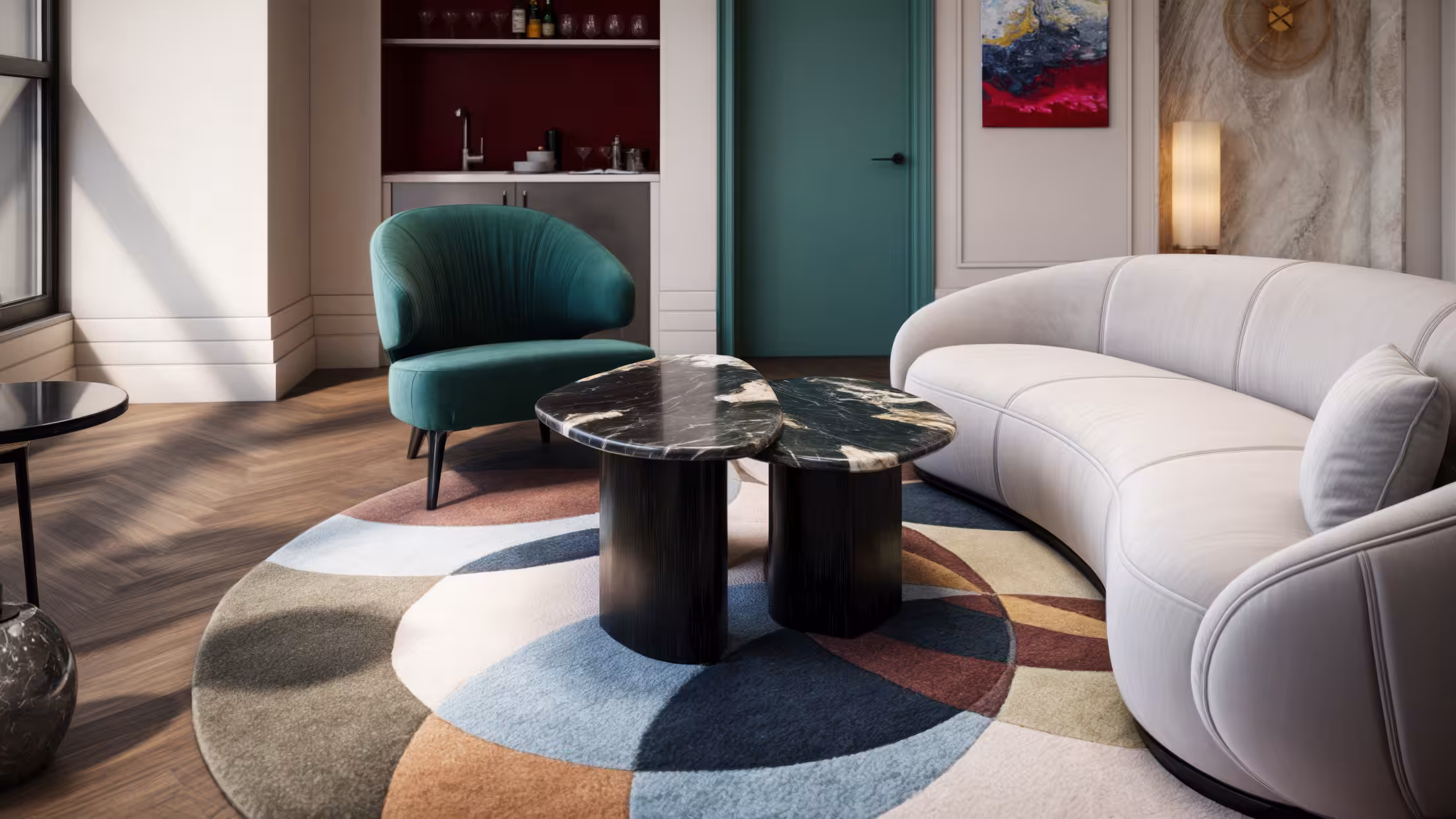 Modern living room with a curved white sofa, green armchair, paired black marble coffee tables, and a colorful circular rug.