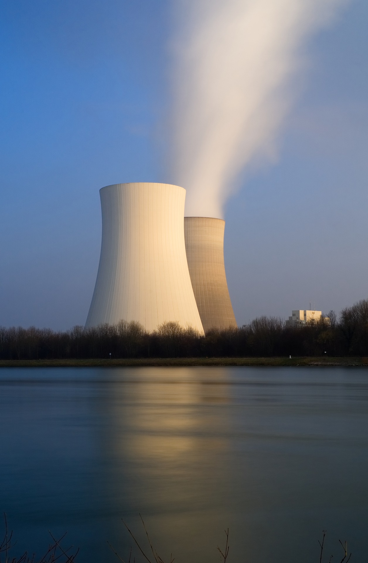power plant by a body of water