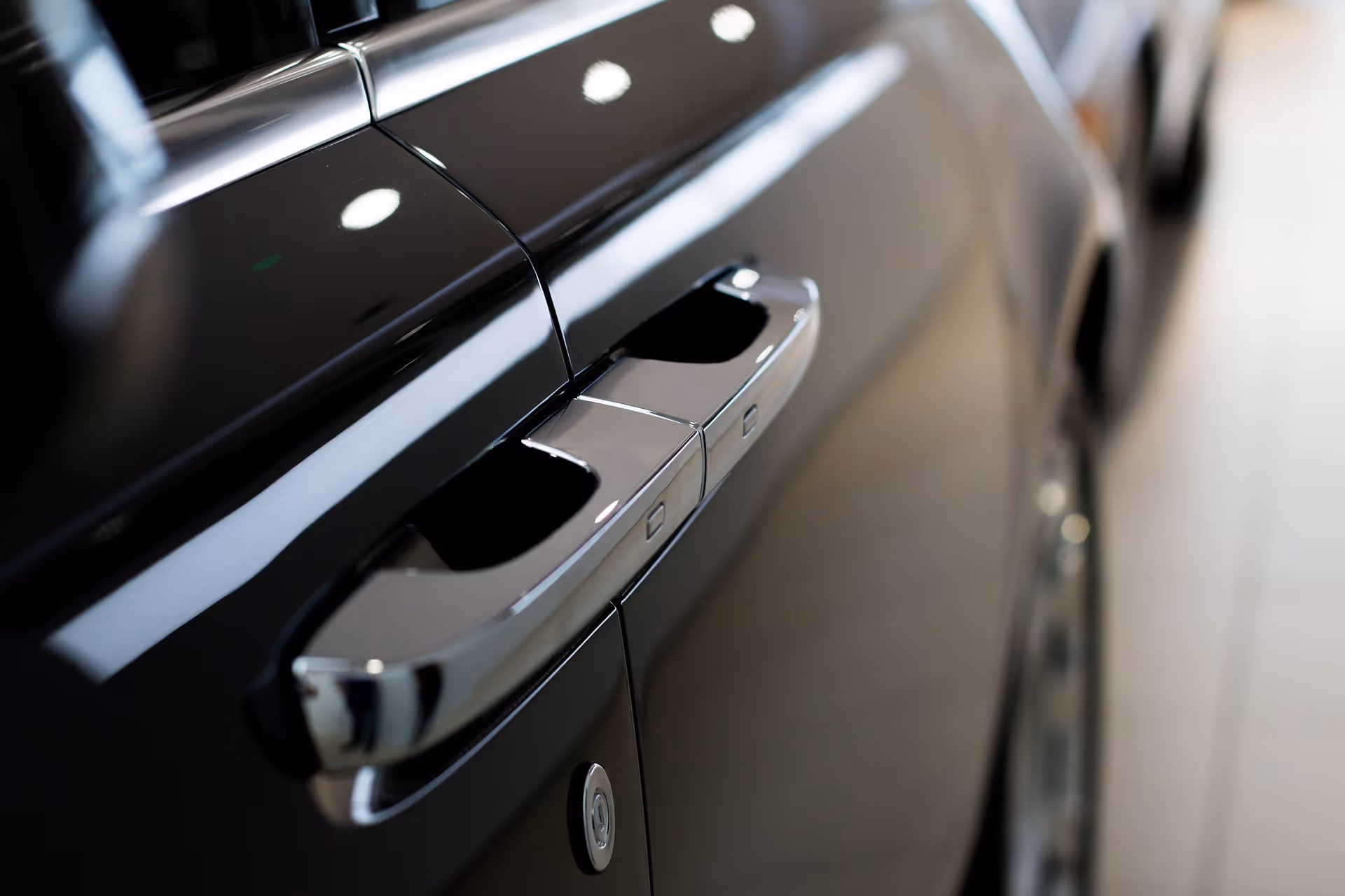 Side view of a car door, representing defective vehicles handled by an auto recall lawyer.