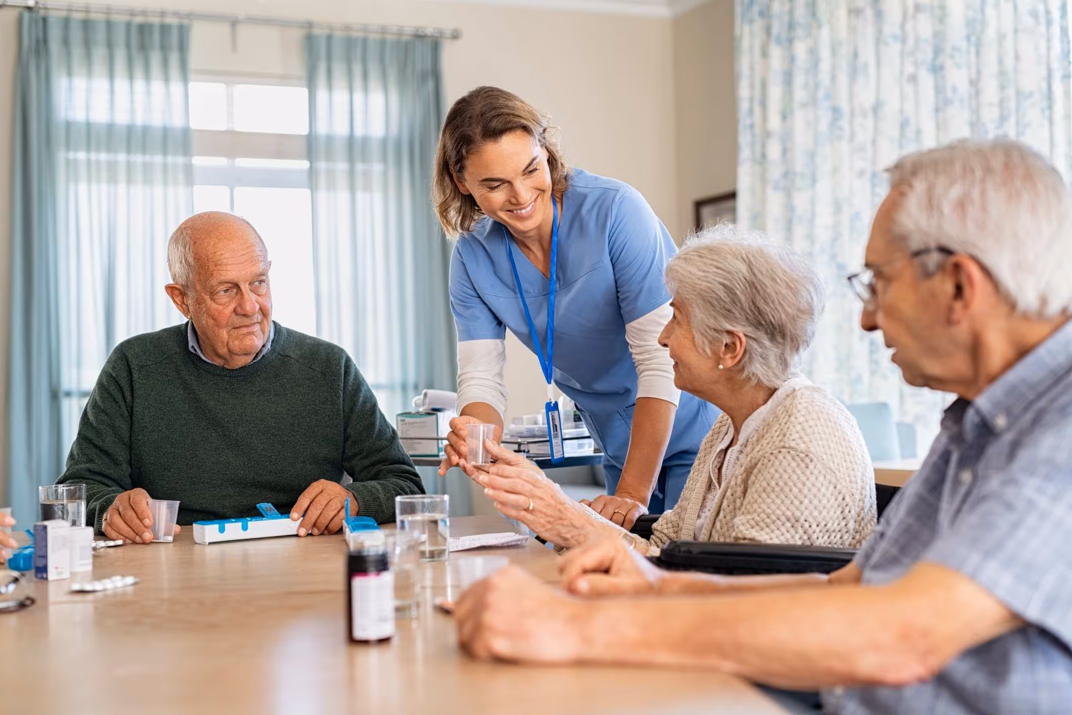 An elderly woman receives the care she needs thanks to a long-term care insurance denial lawyer.