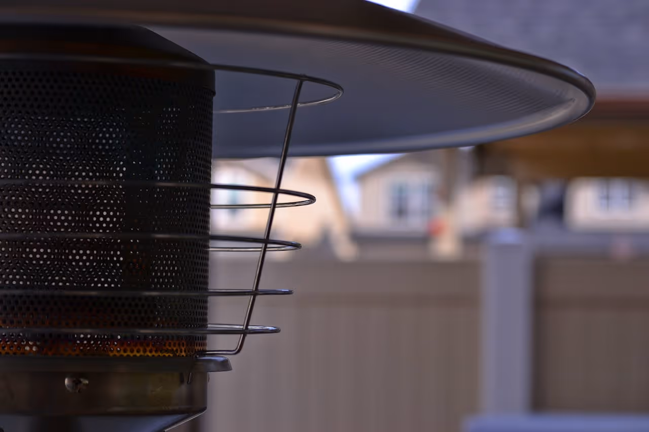 A propane heater on a back patio of a home