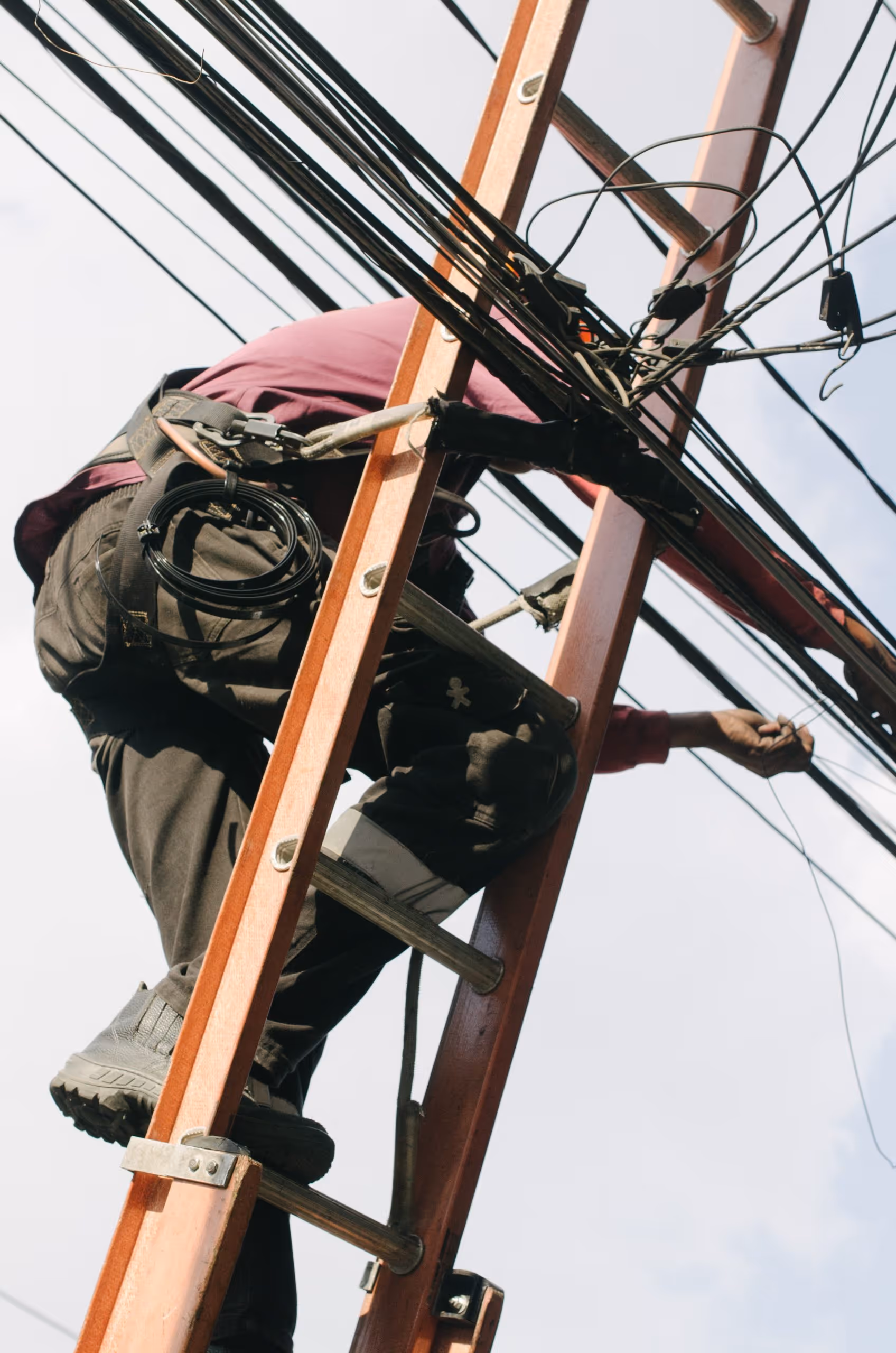 electrician working on power lines