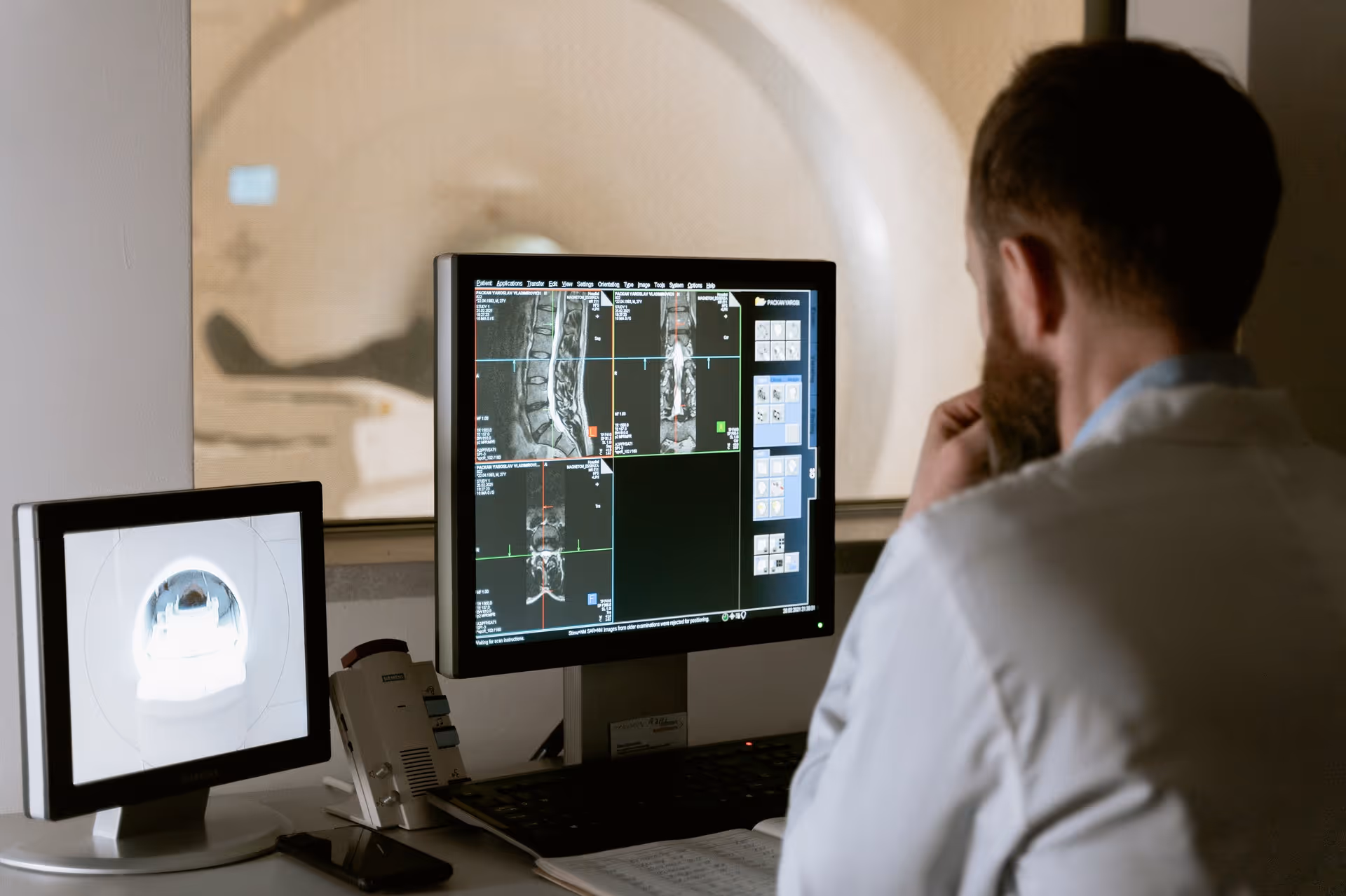 doctor reviews MRI