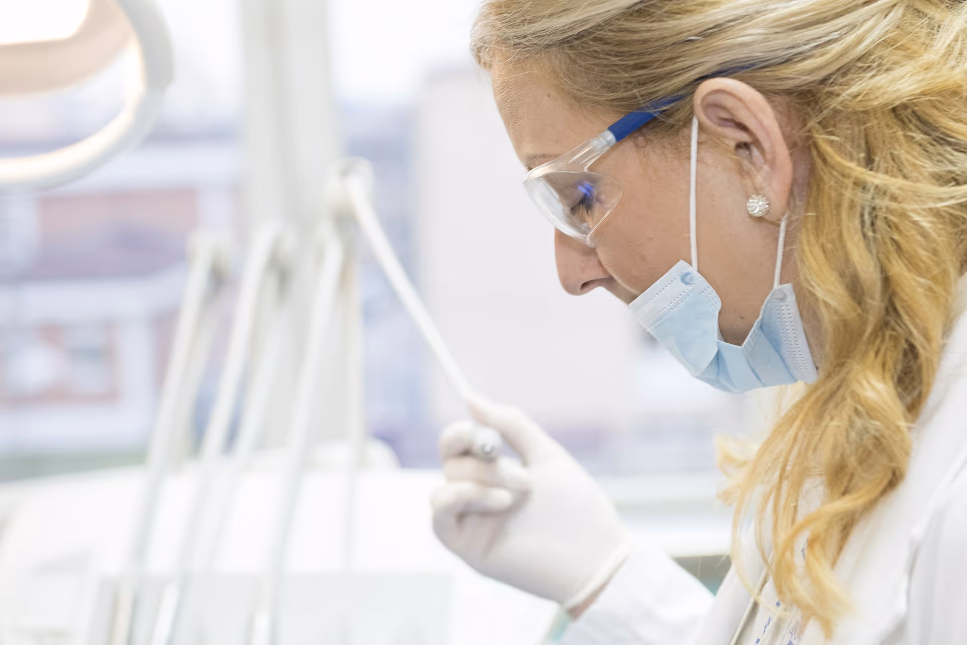 female medical staff with a swab