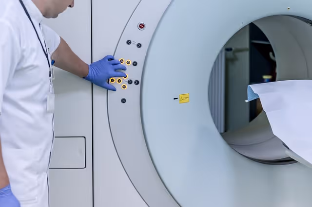 medical professional operating an MRI machine