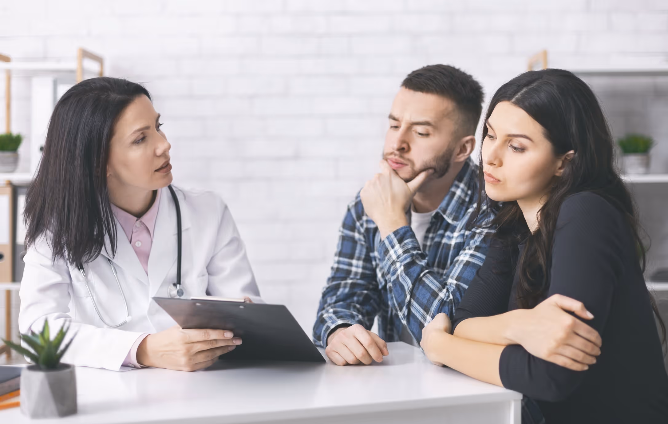 Young couple consults with an IVF doctor