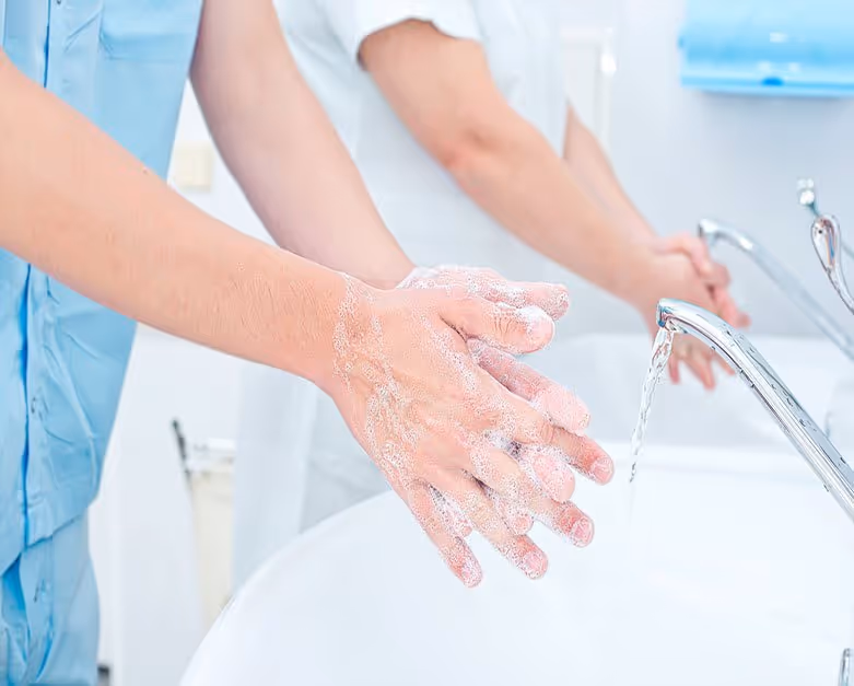 medical professionals washing their hands