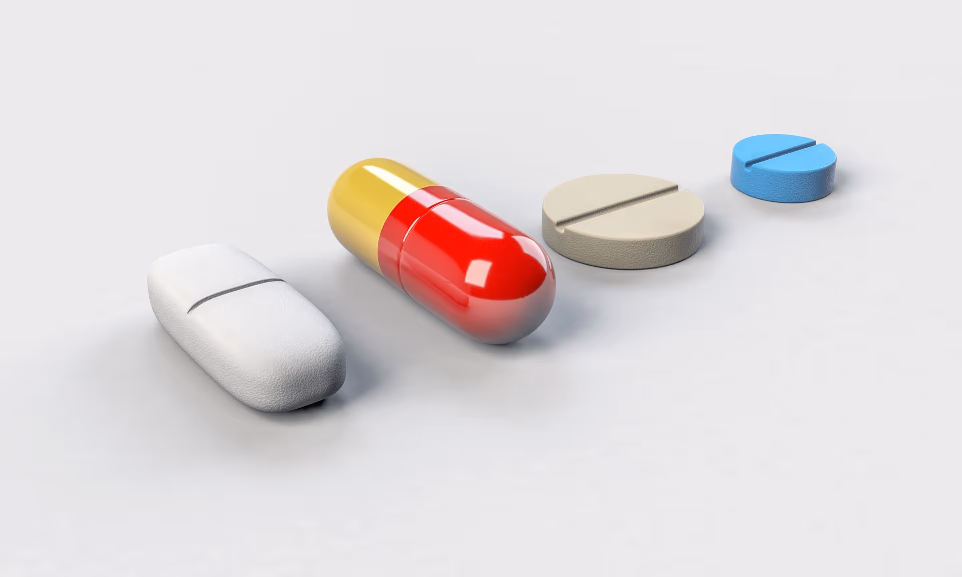 medication graphic with pills on a white background