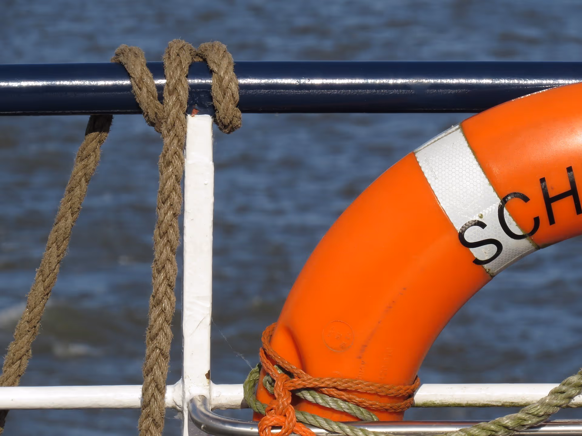 a rope and life preserver on a boat