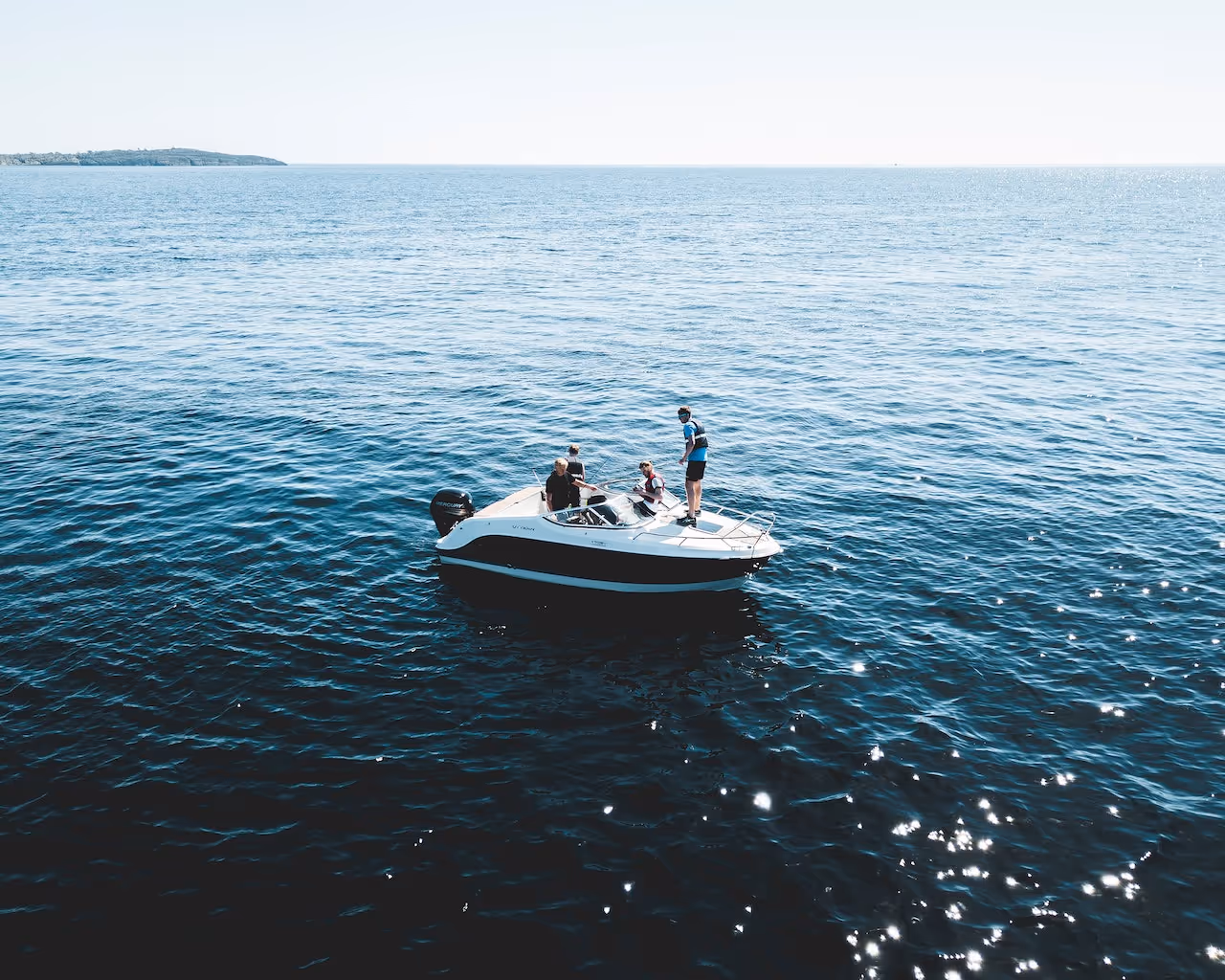 A recreational boat in a large body of water