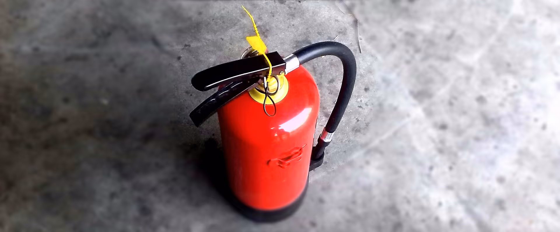 A red fire extinguisher