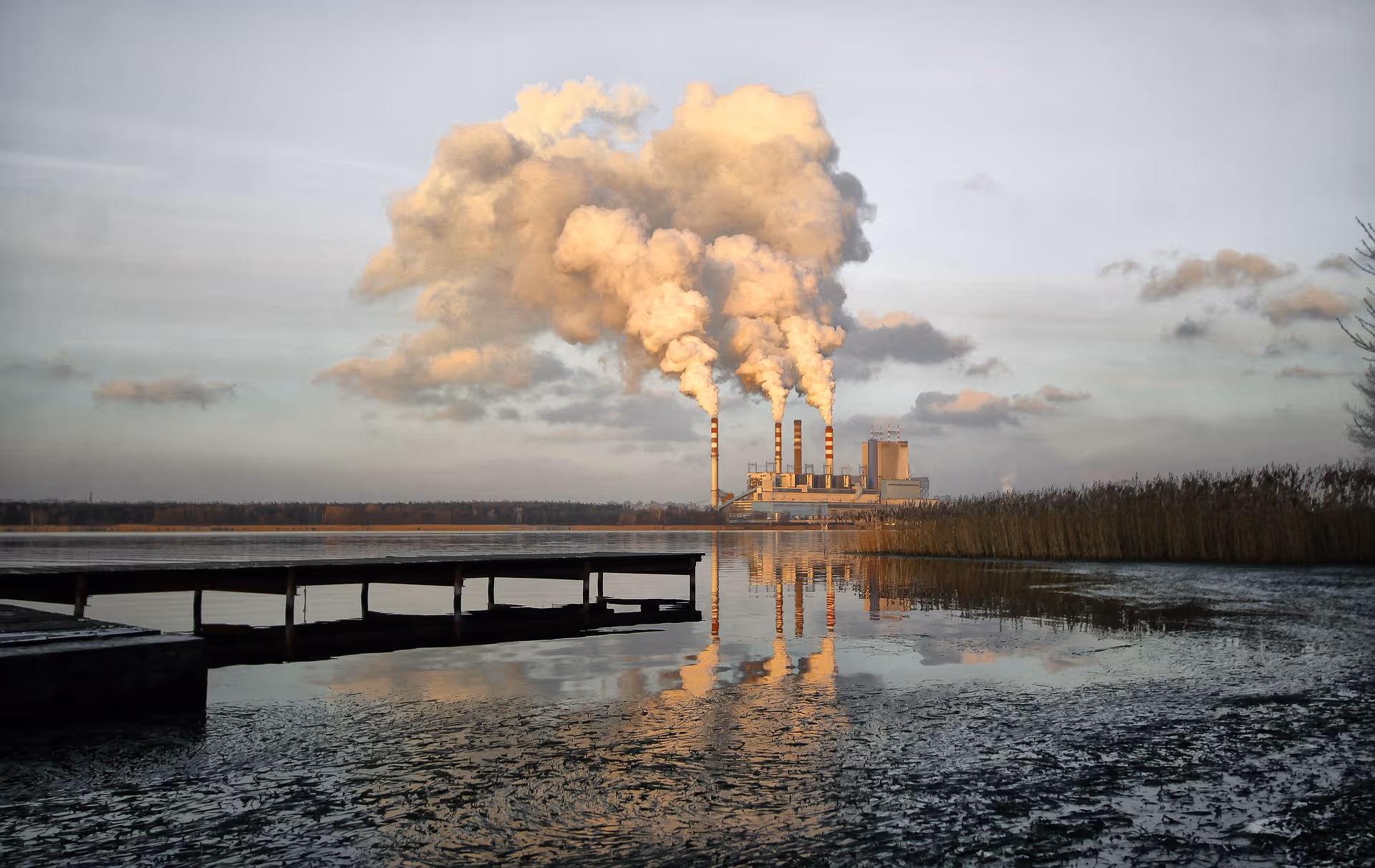 smoke seen billowing from smokestacks at a chemical plant