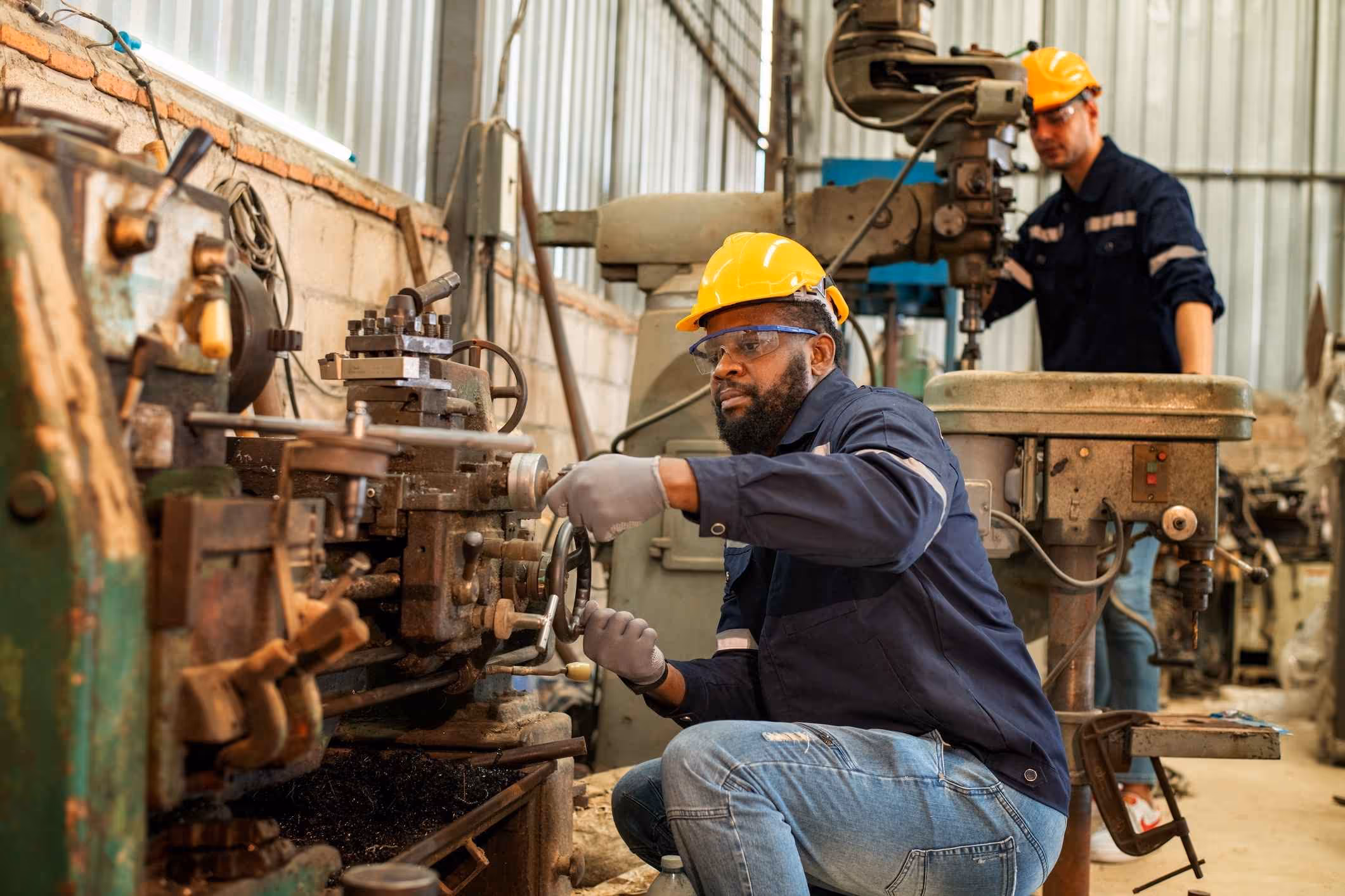 Two chemical factory workers who have just learned about the dangerous connection between benzene and AML.