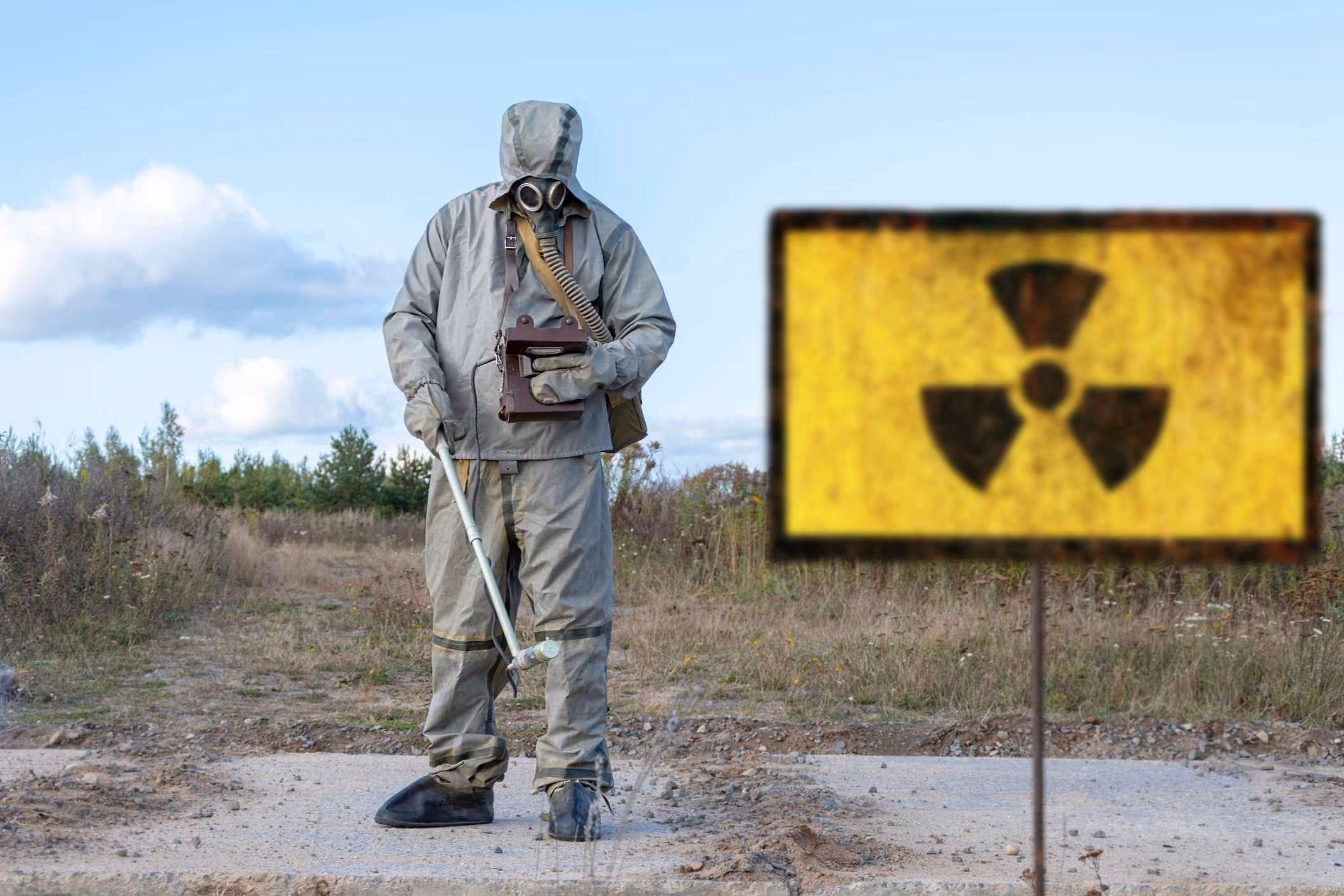 Worker measuring radiation levels, representing occupational radiation exposure lawsuit.