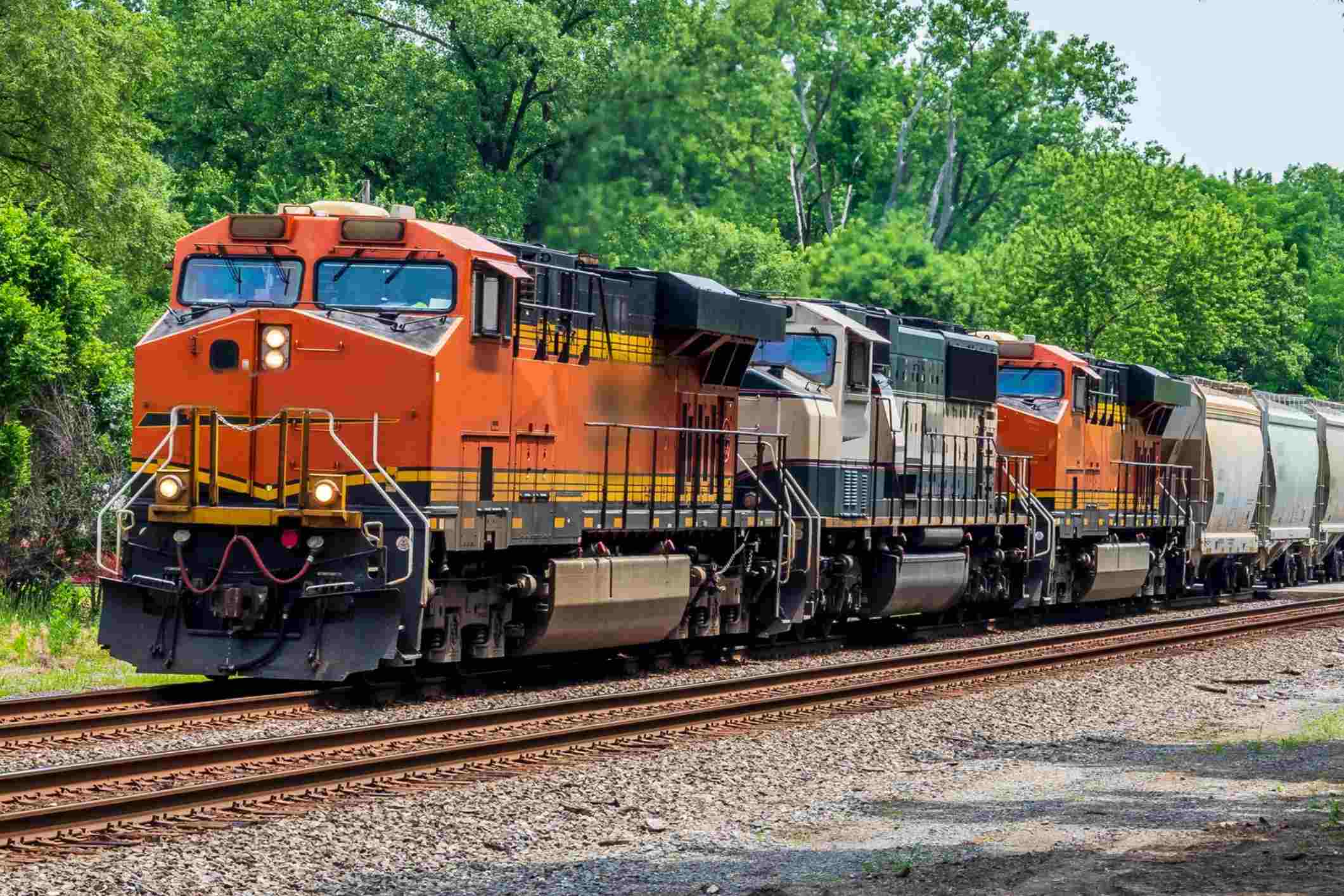 Freight train on railroad tracks, representing a California railroad workers cancer lawsuit involving diesel fumes, asbestos, and other toxic substances.