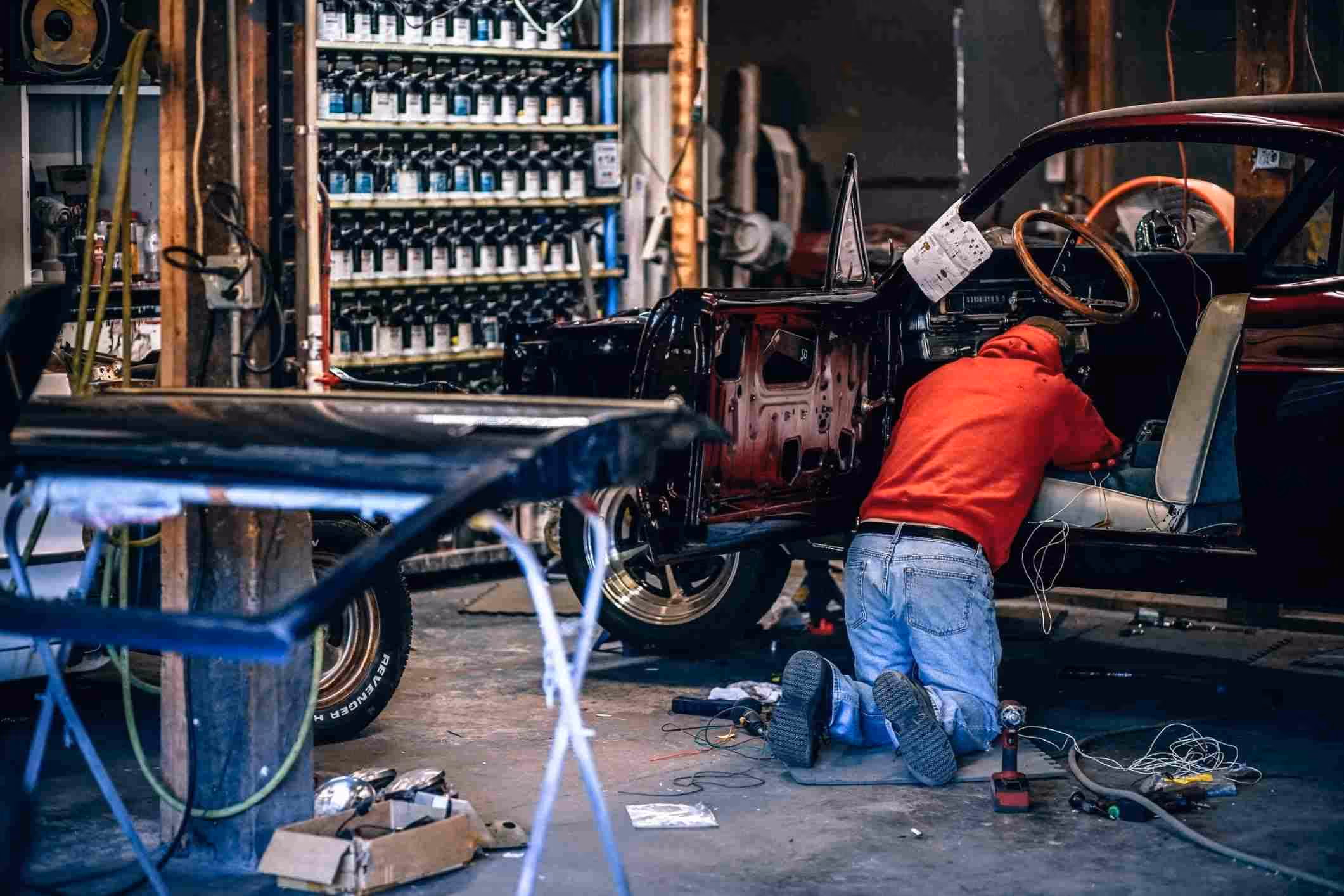auto mechanic working in body shop