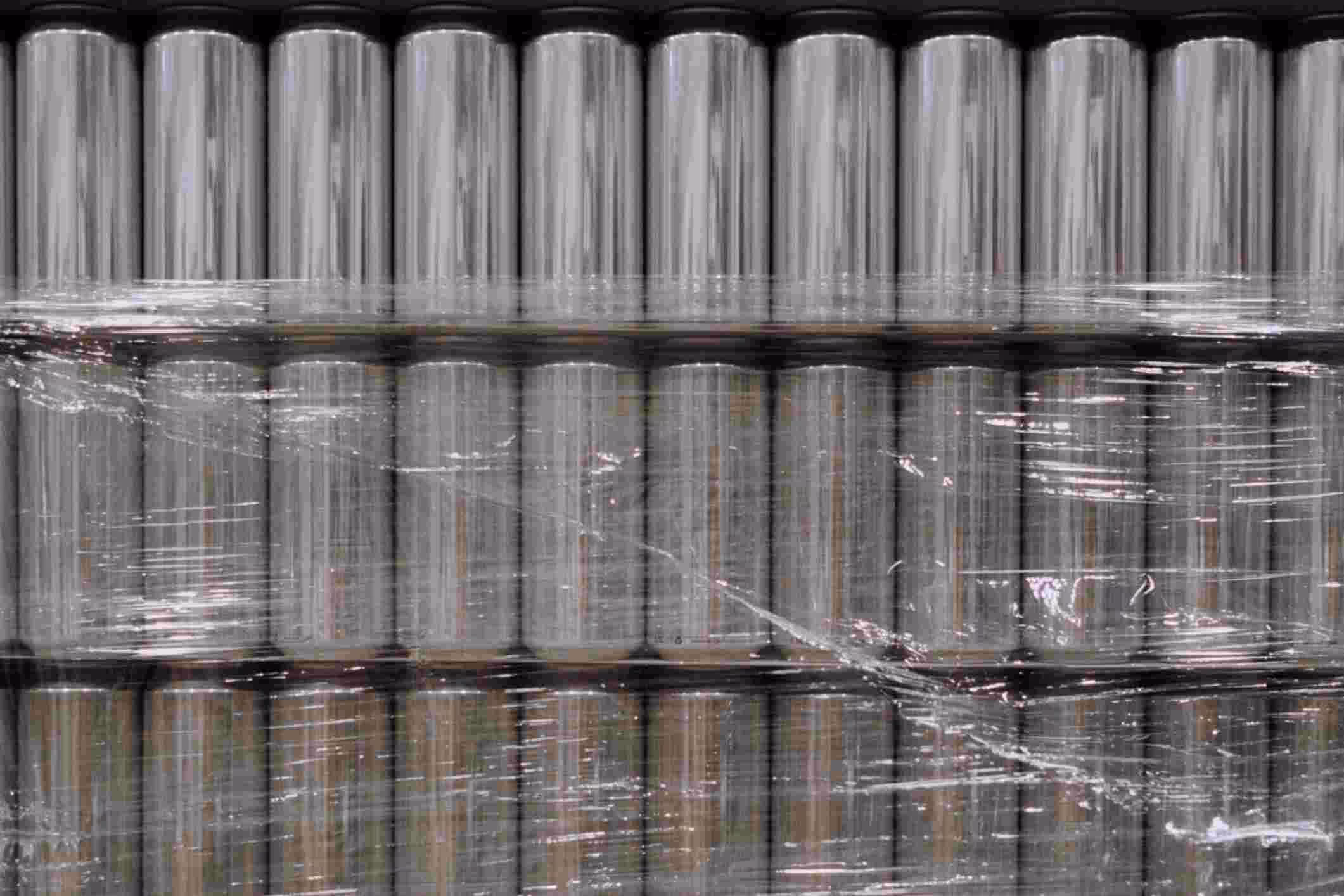 Stacks of unlabeled aluminum cans