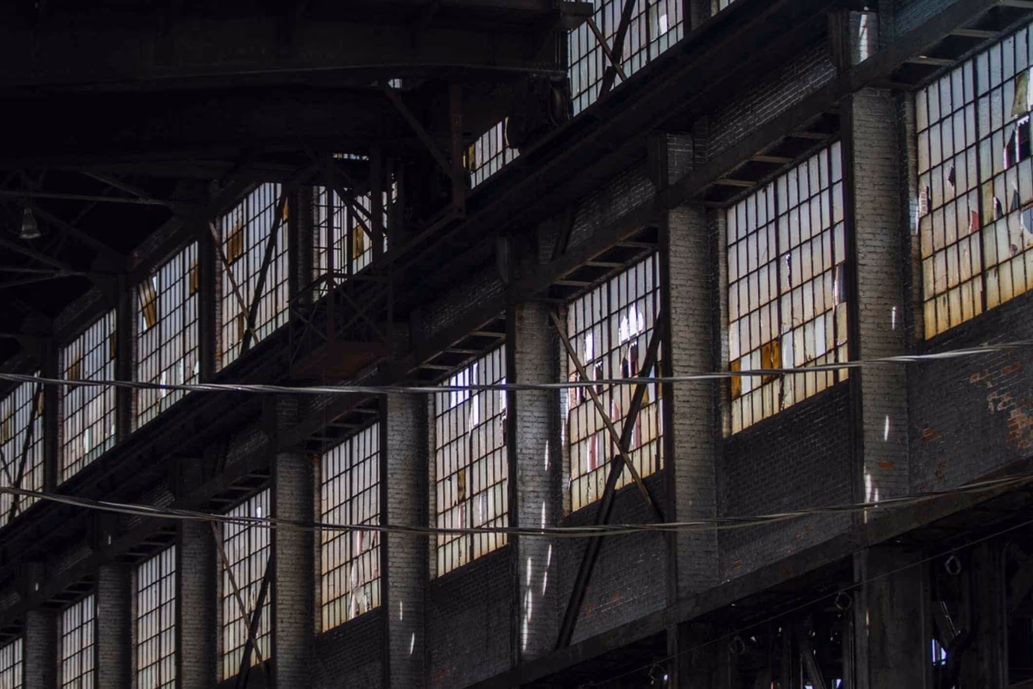abandoned factory or manufacturing plant, likely containing asbestos