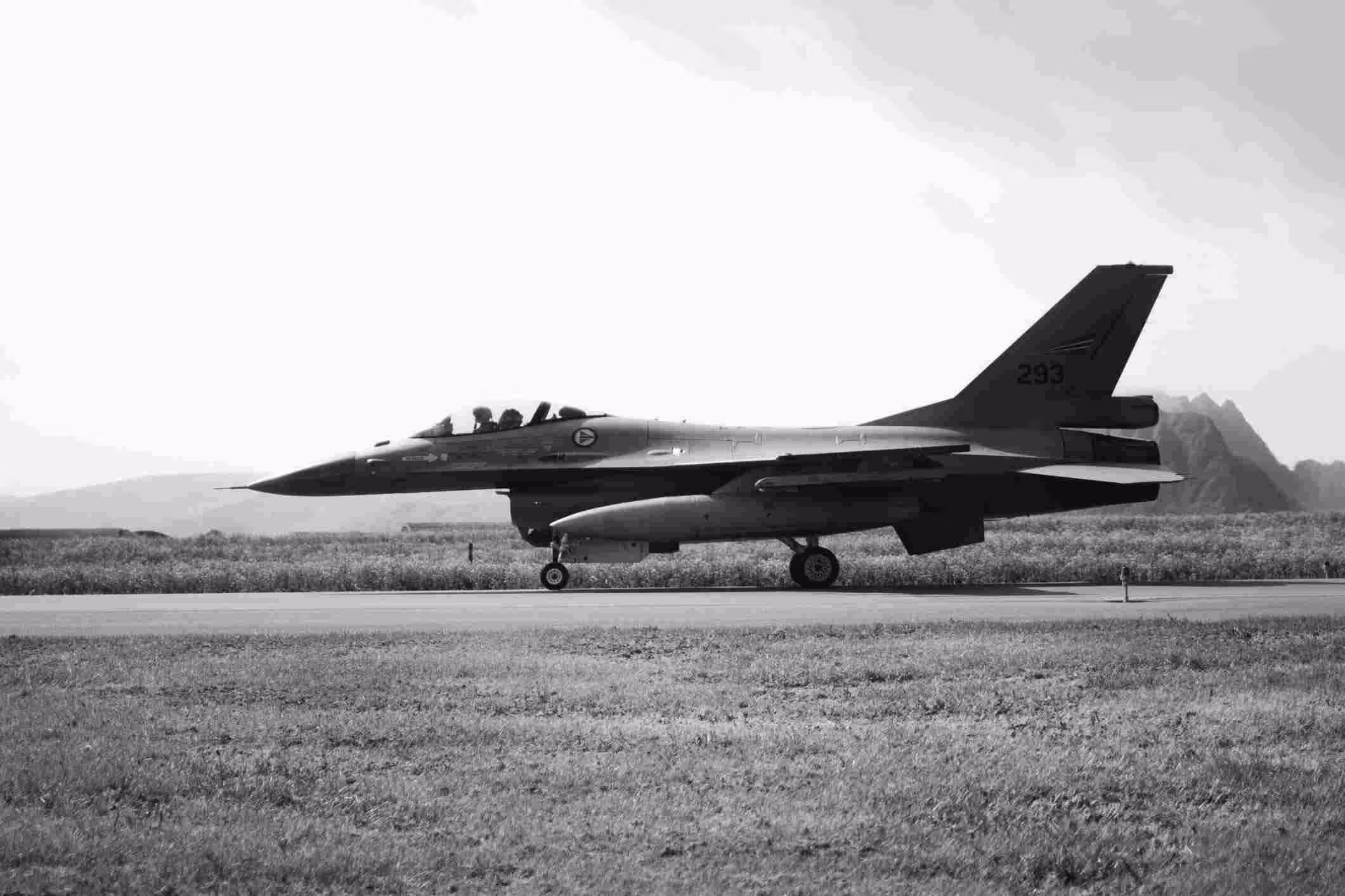 Fighter jet on runway at an air force base