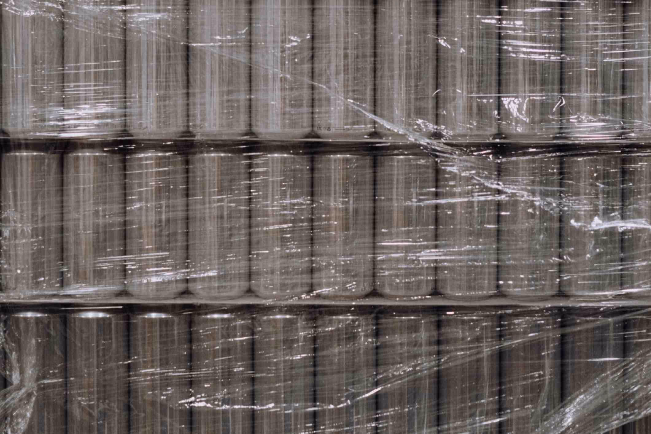 Stacks of unlabeled aluminum cans