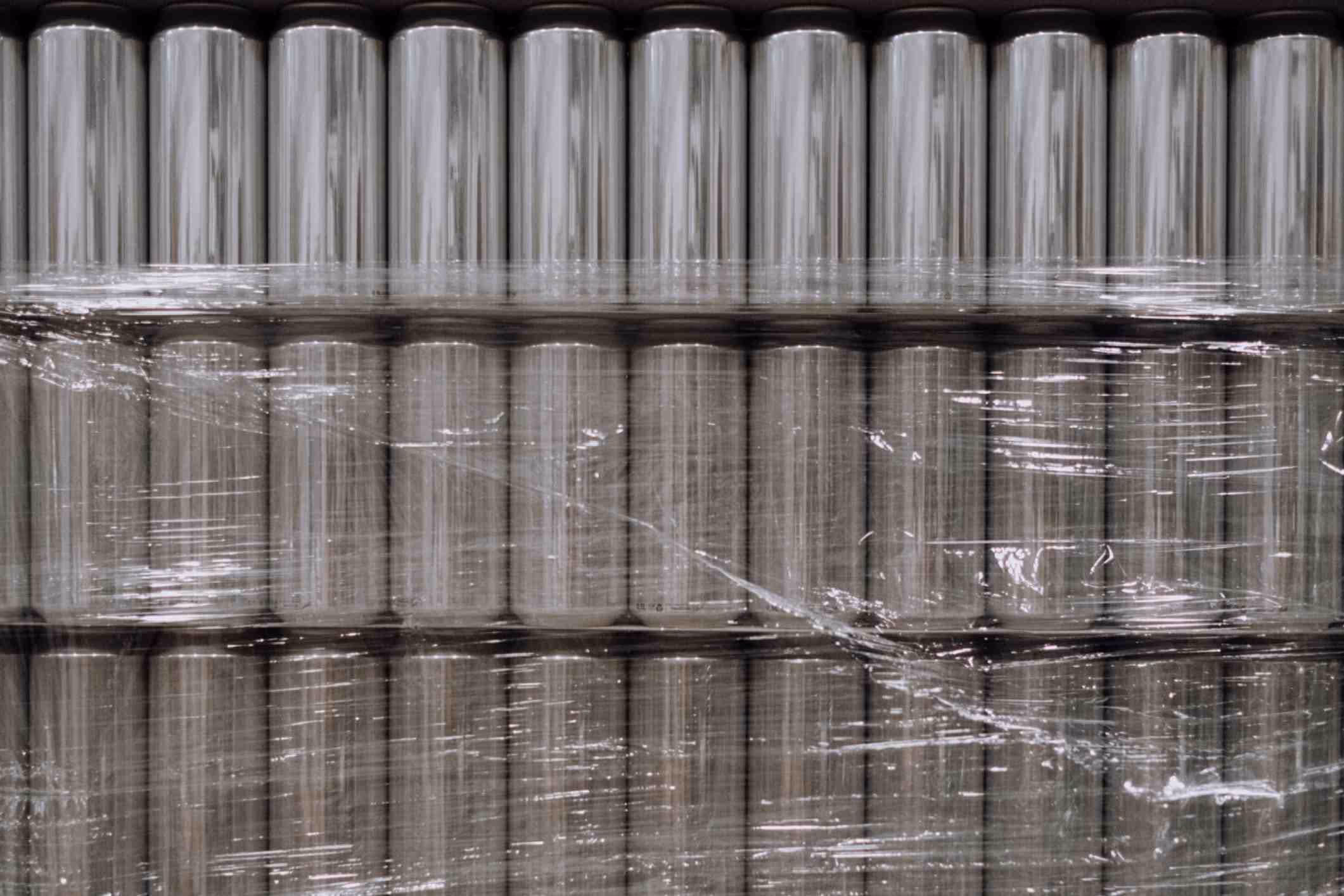 Stacks of unlabeled aluminum cans