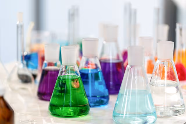lab chemicals in beakers