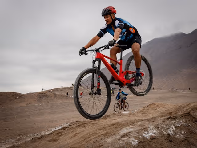 A man riding a mountain bike on a trail