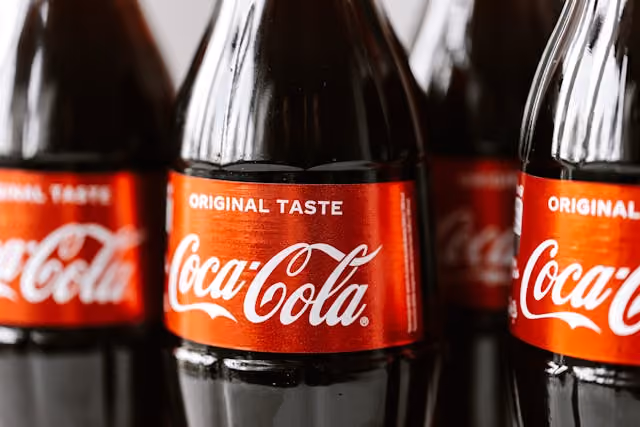 photo of coca-cola bottles